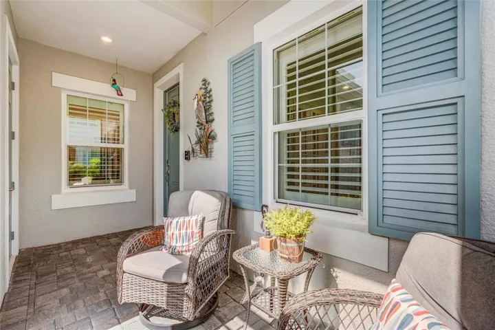 Spacious Screened Paver Front Porch