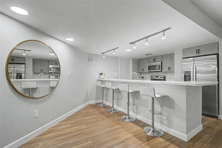 Kitchen with Breakfast Bar, ample room for a Buffet Table, etc.