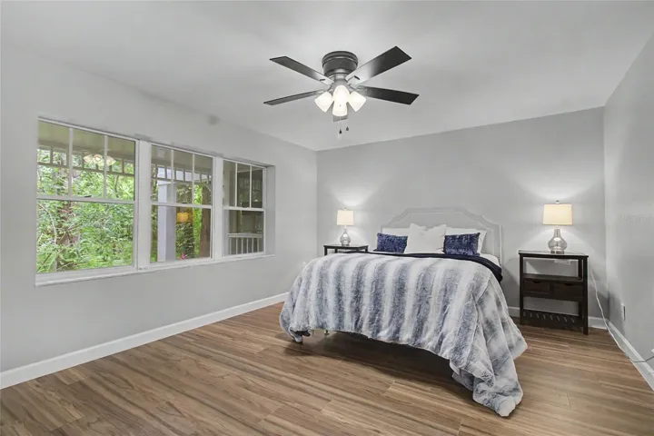 Primary Bedroom with  gorgeouus nature views and sliders to Lanai.