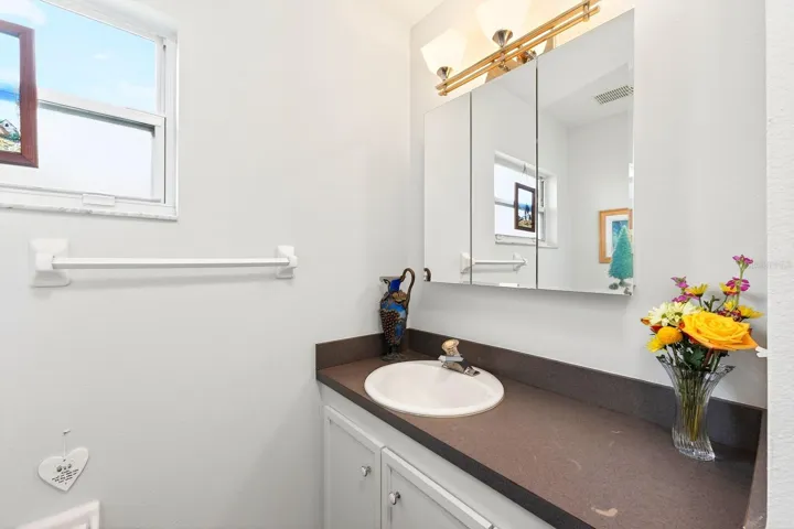 A full guest Bathroom is located near the secondary Bedrooms, perfect for accommodating friends or family.