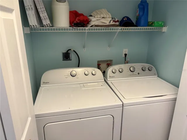 Laundry with washer and dryer.
