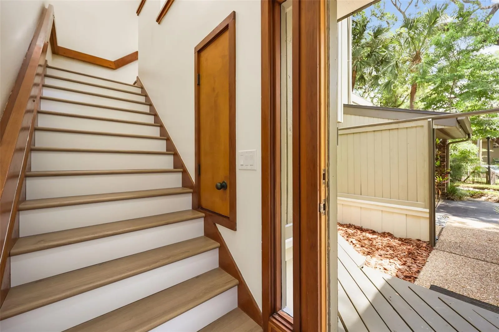 stairs from main living space to sidewalk leading to lake cherokee