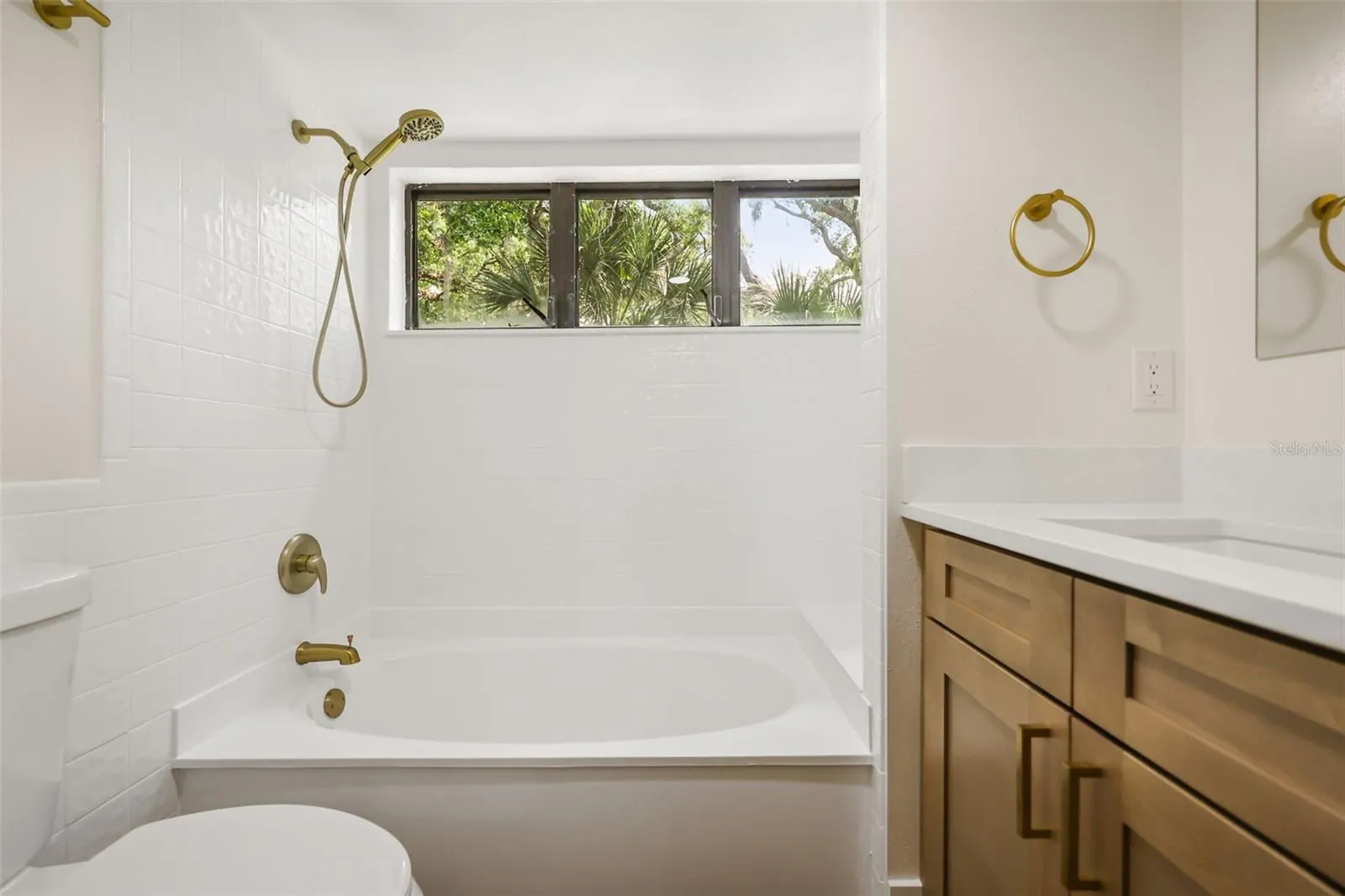 en suite bathroom with tub connected to 2nd bedroom on 3rd floor