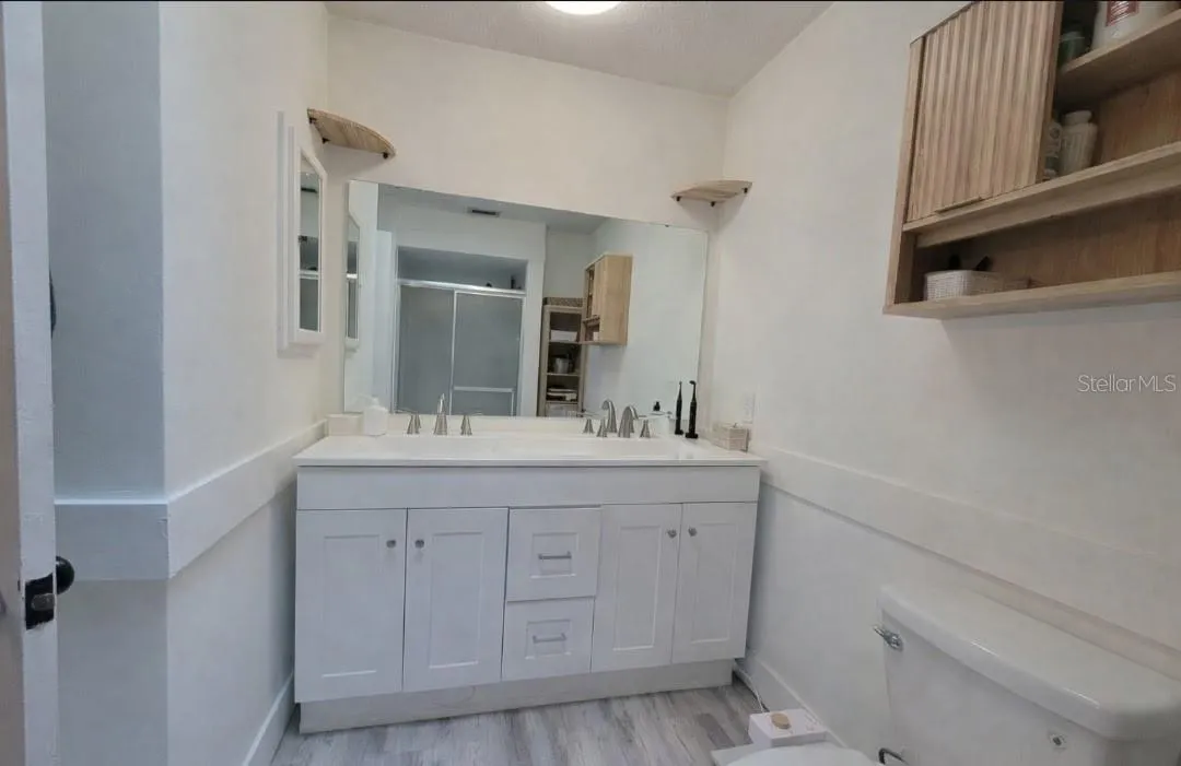 masterbath with walk in shower and new vanitys
