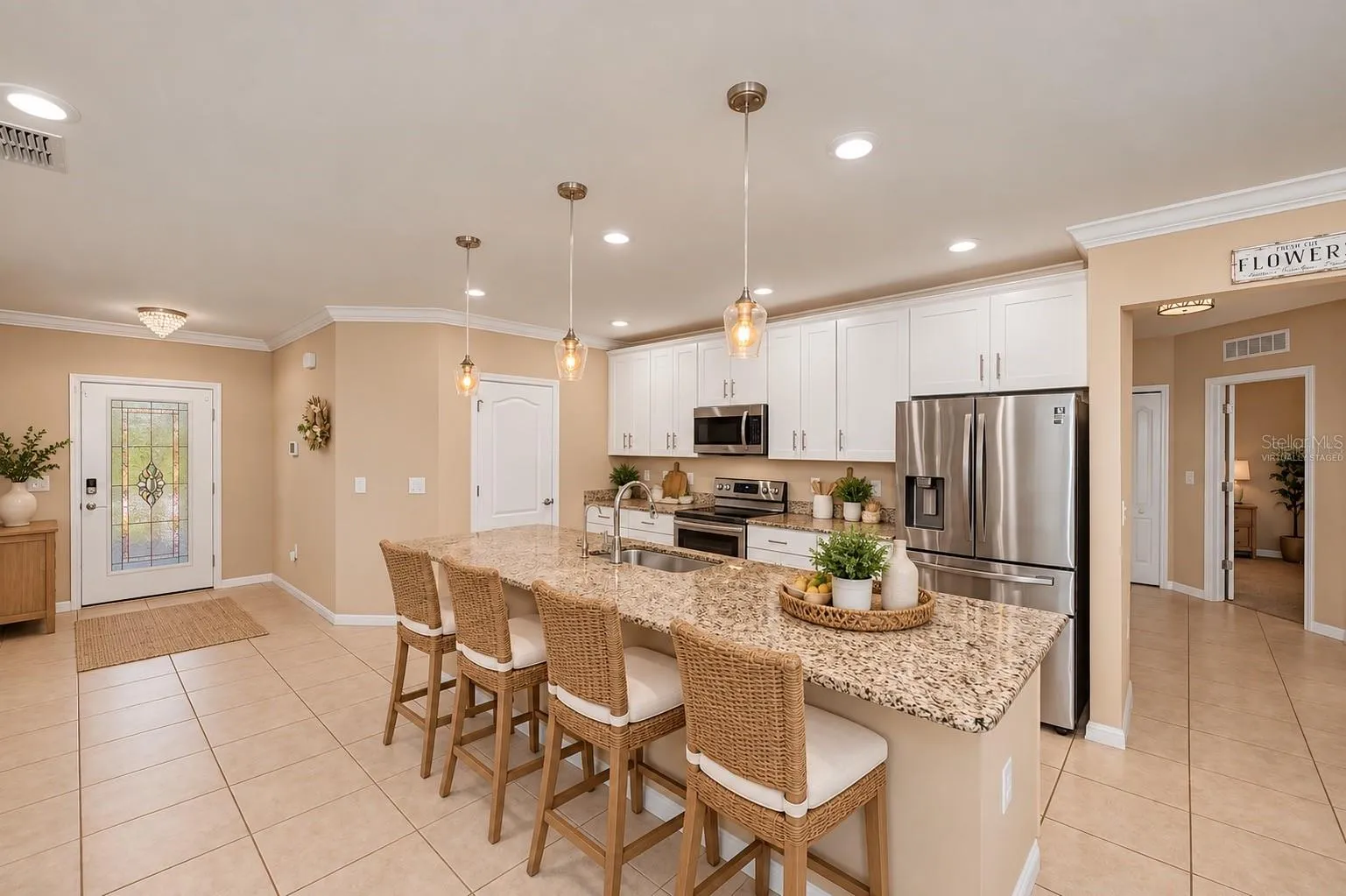 Virtually Staged Kitchen Features Granite Countertops, Stainless Appliances &amp; Massive Breakfast Bar.