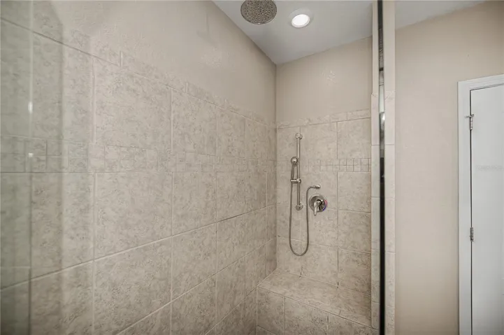Walk-In Shower with Seamless Glass Enclosure.