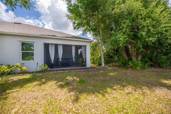 Mature Landscaping and Peaceful Wooded Greenbelt Views.