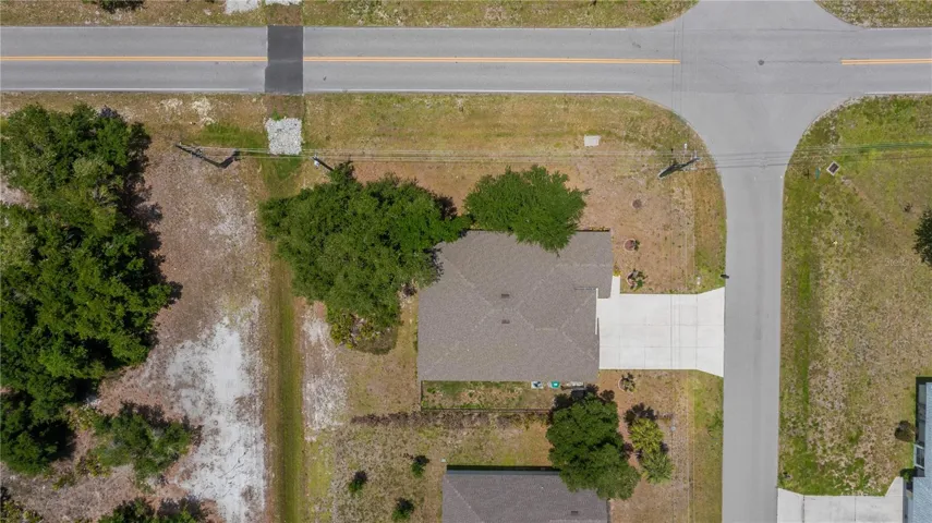 Corner Lot with Expansive backyard and Wooded Greenbelt Buffer.