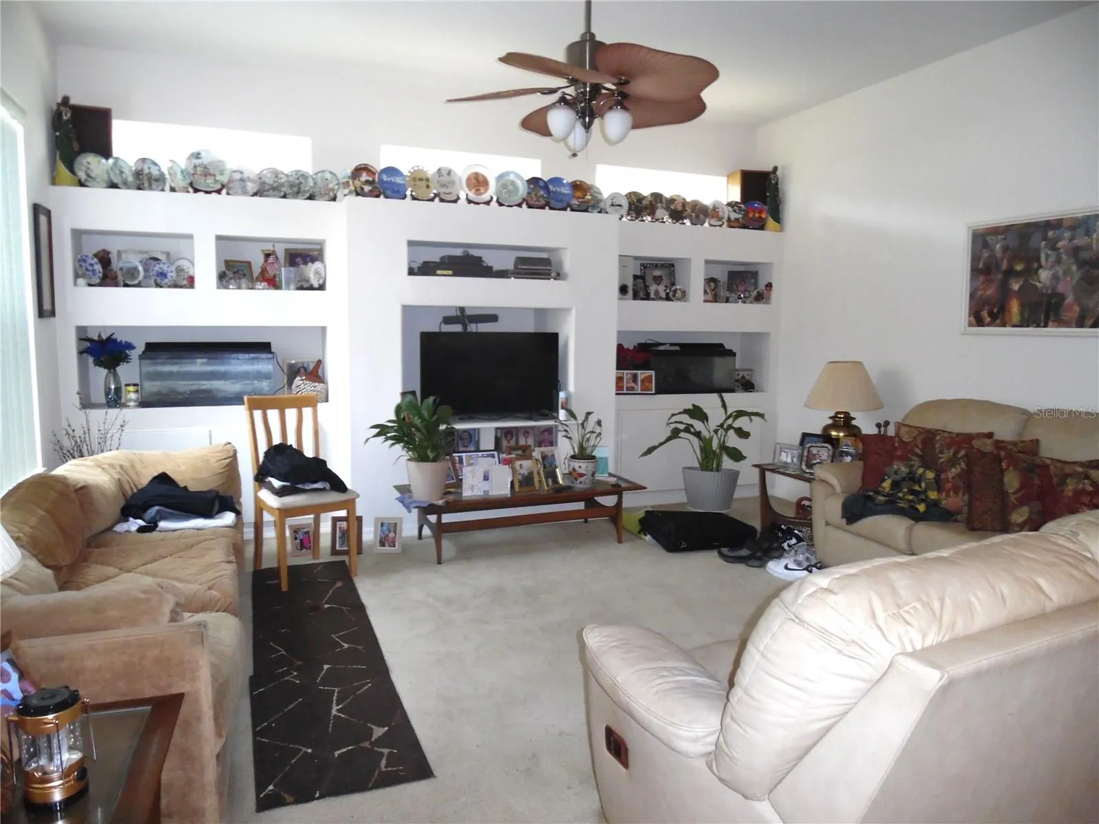 Family Room sitting in back of home overlooking kitchen