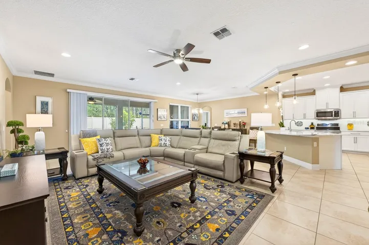 Living area has telescopic sliding glass doors for seamless indoor/outdoor living.