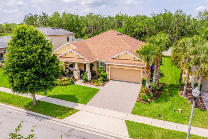 Perfectly situated inside the GATED ENCLAVE of Retreat at Lake Charm, this beautifully upgraded single-story home delivers elevated living with every detail thoughtfully designed for the way you live and entertain!