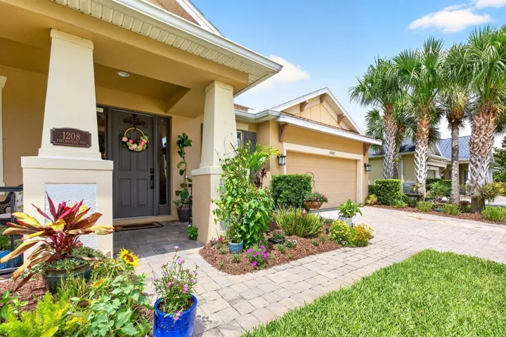 Inviting covered front entry.