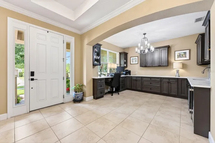 Bonus/flex space at the front of the home delivers custom built-ins.