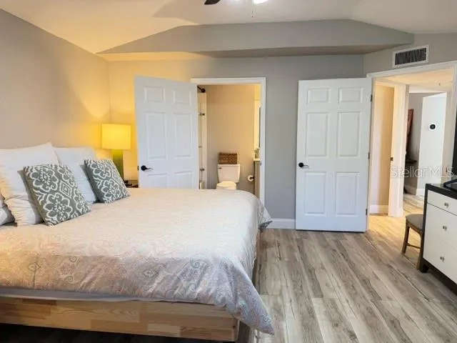 view from office nook in master bedroom to hallway and master bathroom