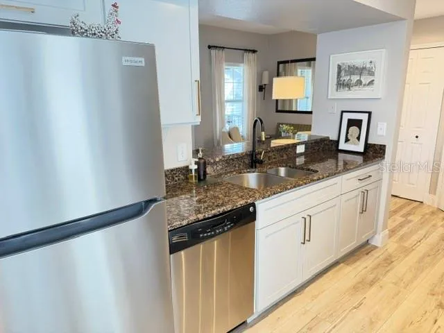 Counter / sink side with pass through to dining and living room areas