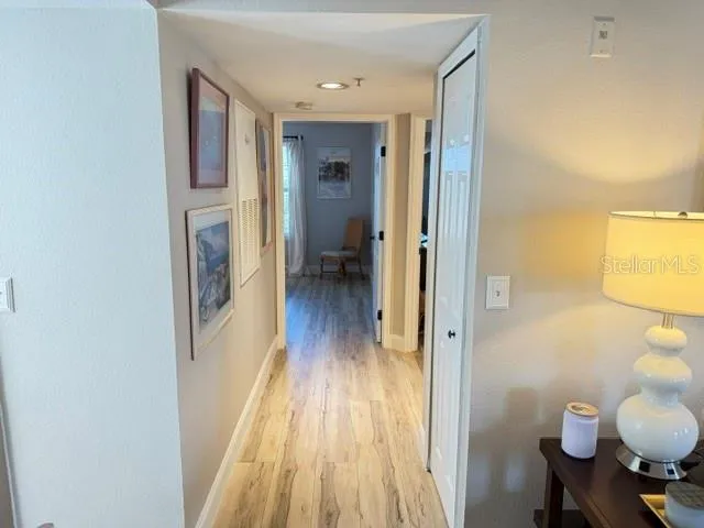 Hallway to bedrooms - LVF throughout!