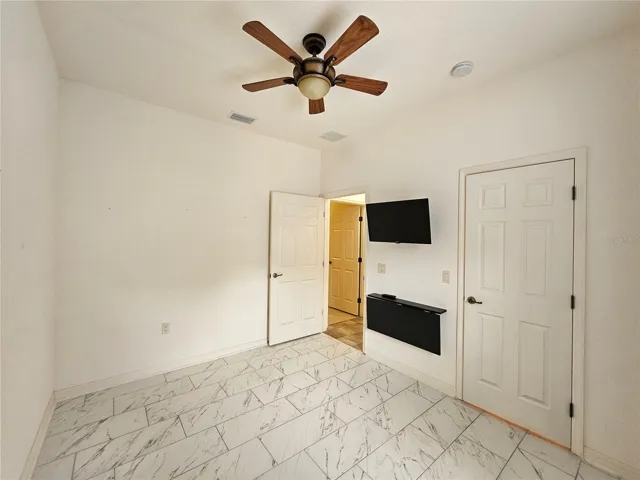 Bedroom 2 with TV and Built In Desk