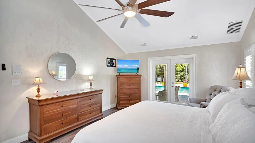 Primary Bedroom exits to covered patio lanai