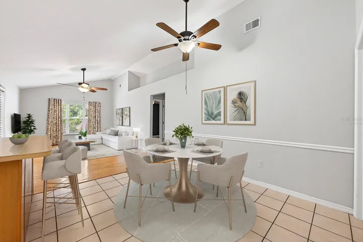 The inviting Dining area just off the Kitchen, is ideal for relaxed everyday dining. Virtually Staged
