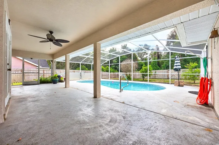 Step outside and enjoy your own PRIVATE BACKYARD OASIS.