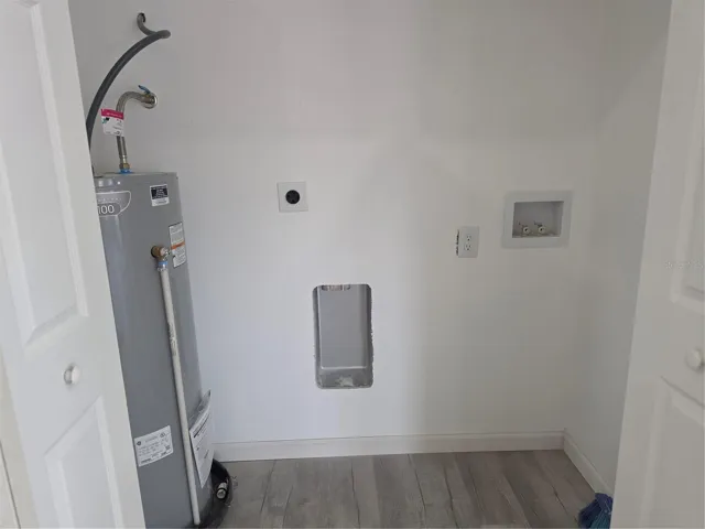 Laundry room, new hot water heater, washer and dry hookups