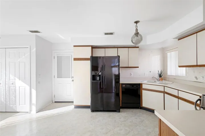 Kitchen with the door to the garage