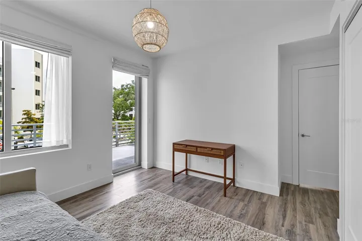 Bedroom 2 with door to balcony
