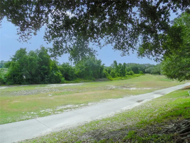 View over looking the golf course and golf cart trail