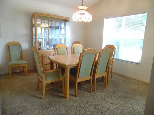 Dining Room has sliding glass doors leading out to enclosed back patio