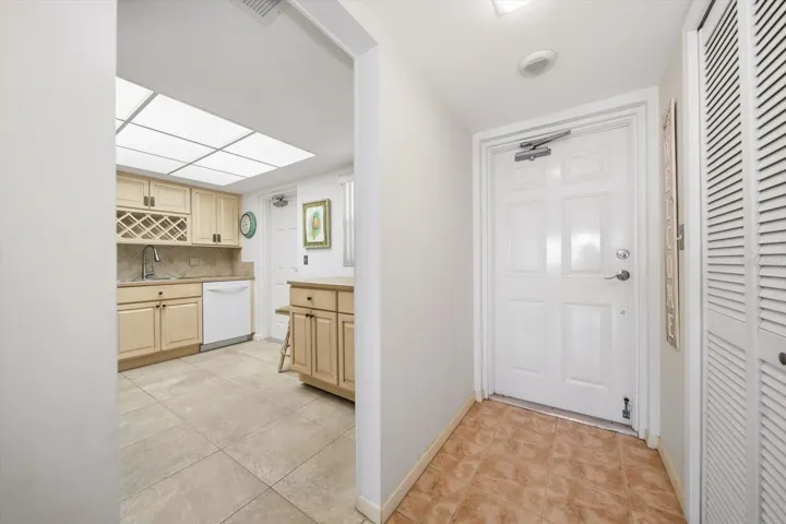 Entry way - looking straight you'll see beautiful water views. We're starting with the kitchen!