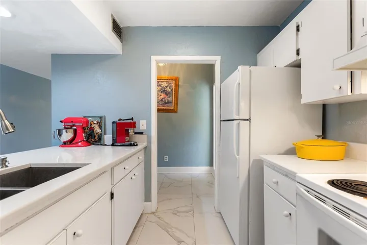 Kitchen looking towards entry hallway