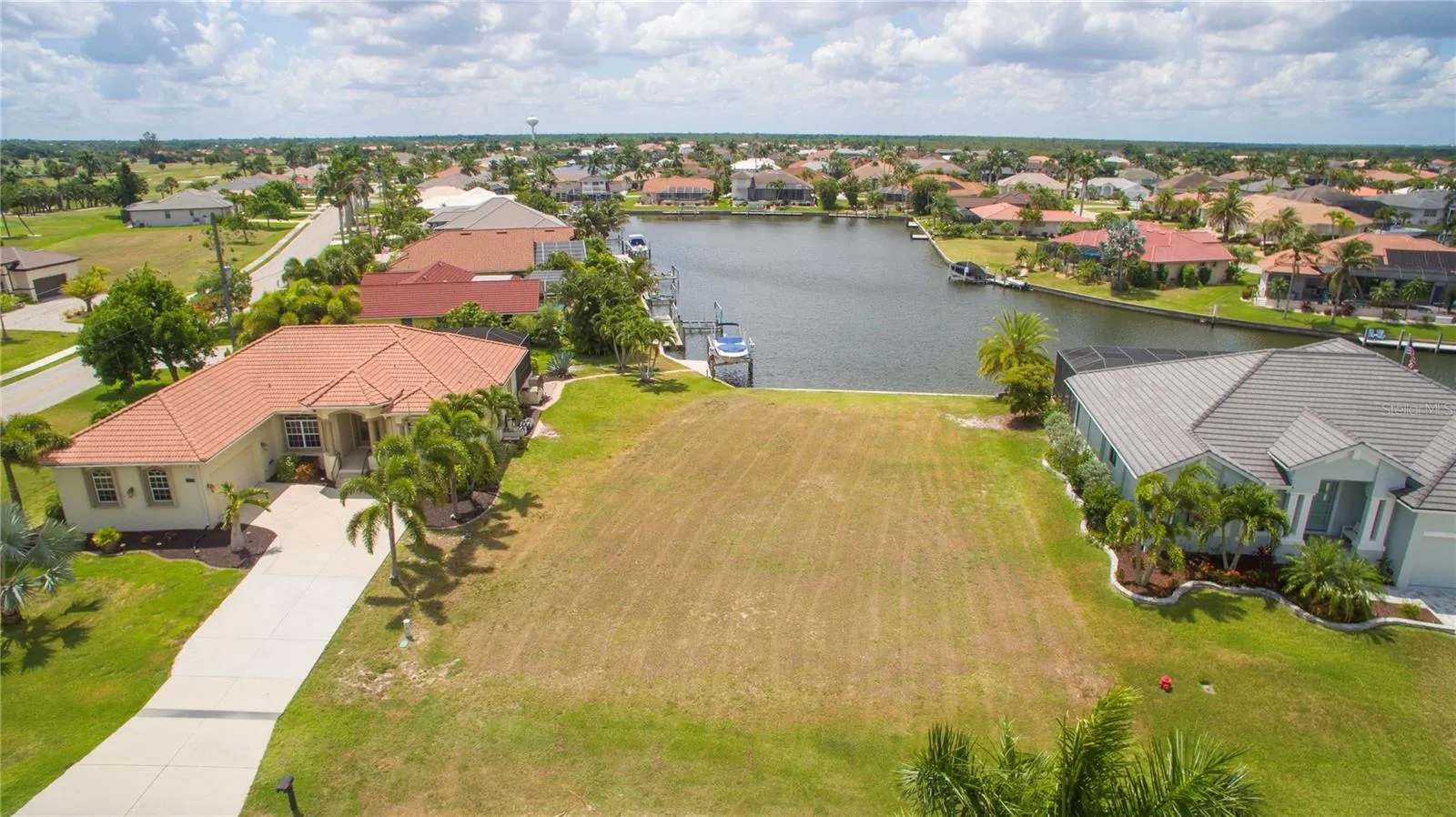 507 Madrid Blvd - Fronts on a basin and has excellent sailboat or power boating access to Charlotte Harbor and the Gulf.