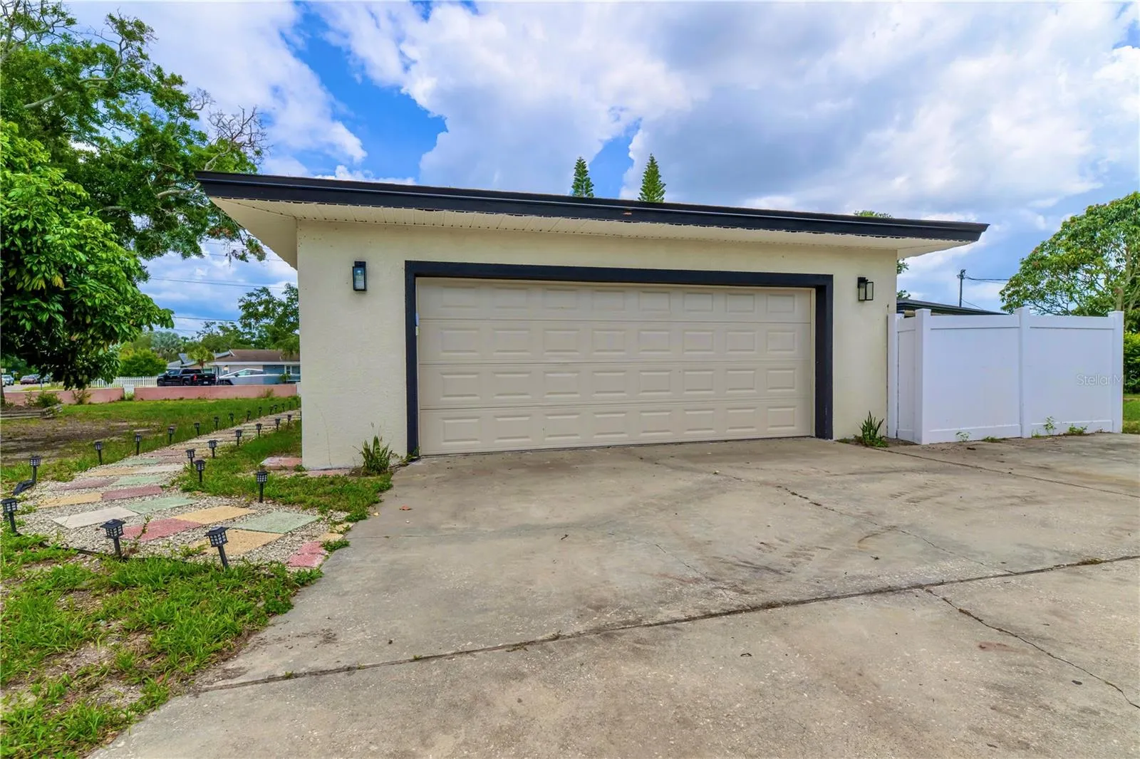Paved Walkway to Front of House and 2 Car Garage