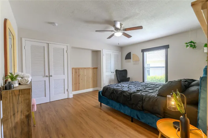 Bedroom 2 Entry view, Wood Slat Wall Accents, & Ceiling Fan