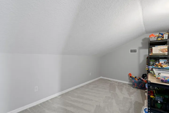 Just off the bonus room is an air conditioned storage area (very private home office space)