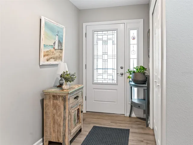Inviting foyer includes rare hallway closet.