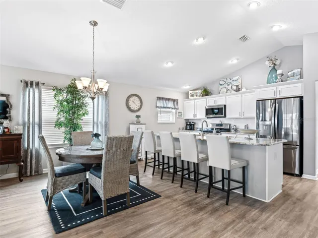 Bright, open kitchen with a cozy breakfast nook.