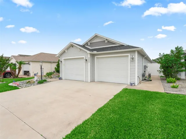 Split garage with room for your car and golf cart.