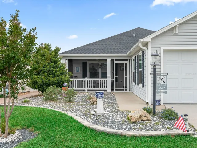 Beautifully upgraded landscaping adds charm and value.