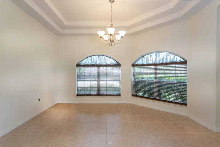 Formal dining room with double trey ceiling