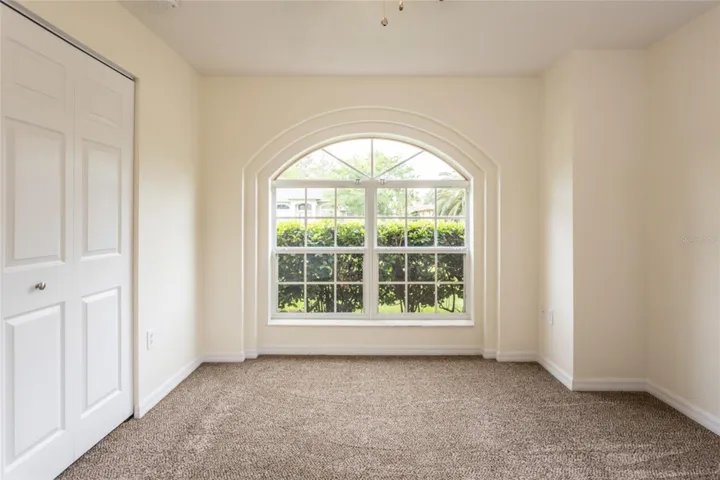 Another view of the front bedroom - check out the details around that window.