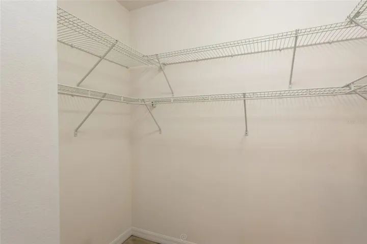 Plenty of room in the primary bedroom closet.