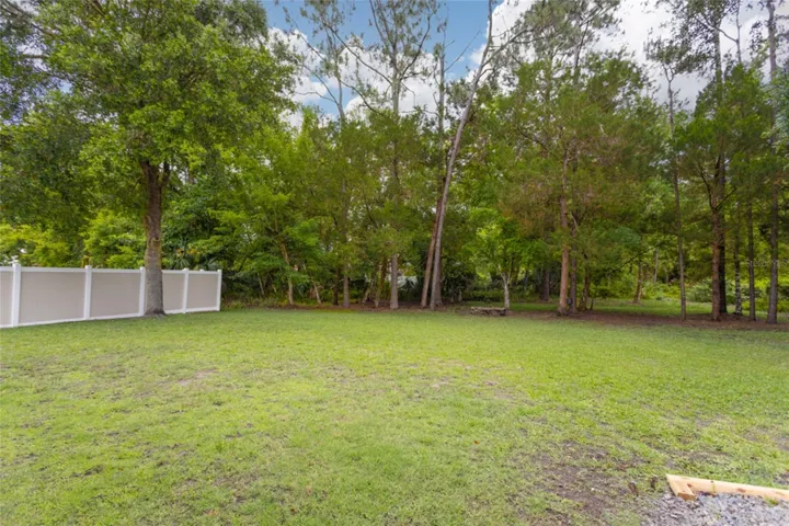 Yard is already fenced by the neighbor on the left side.
