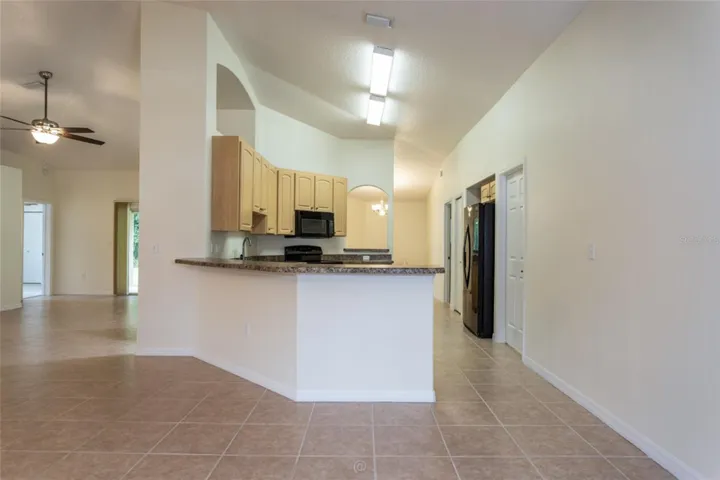 View from dining room into the spacious kitchen --great for entertaining.