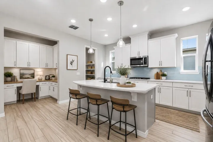 Virtually staged kitchen and pocket office