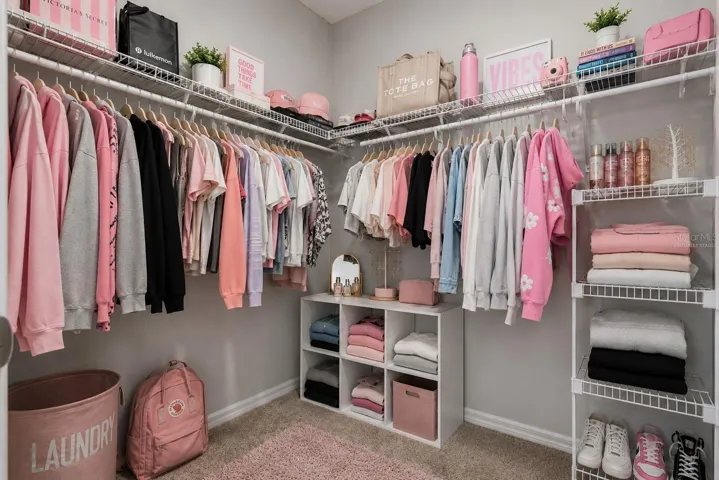 Virtually staged closet in Bedroom 2