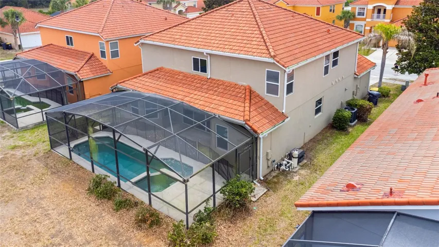 Screen enclosure keeps the pool clean and the bugs out