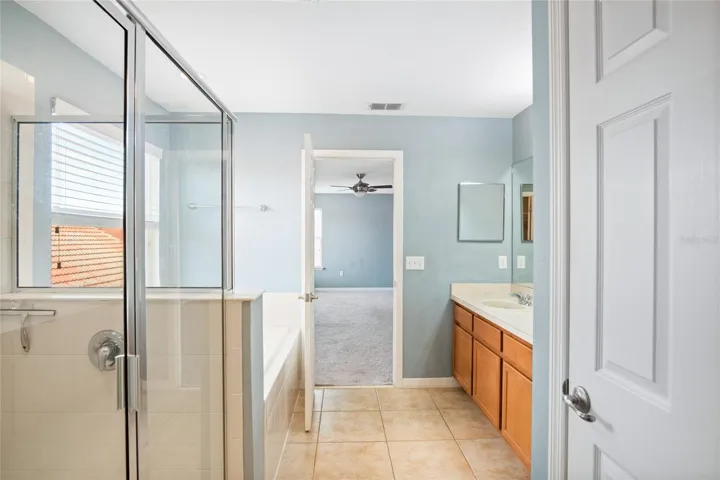 View from the double walk in closets of the primary bathroom on the second floor