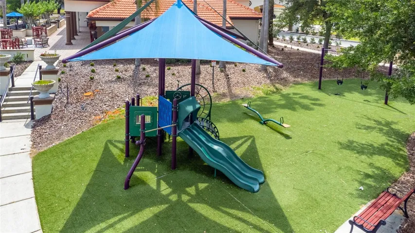 Community Playground and swings with seating areas for parents