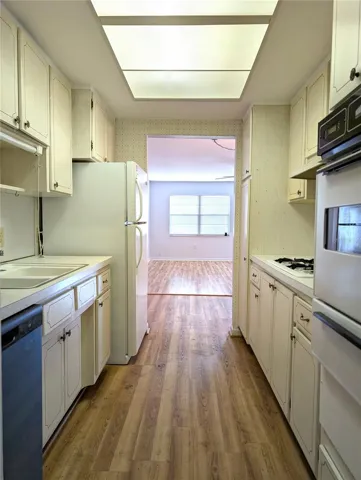 Kitchen view towards Living Room and Entrance